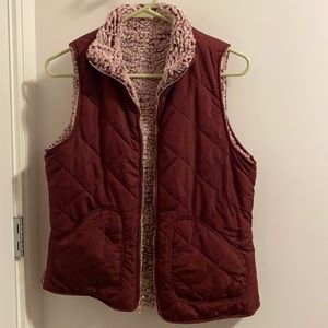 Reversible size small maroon colored vest